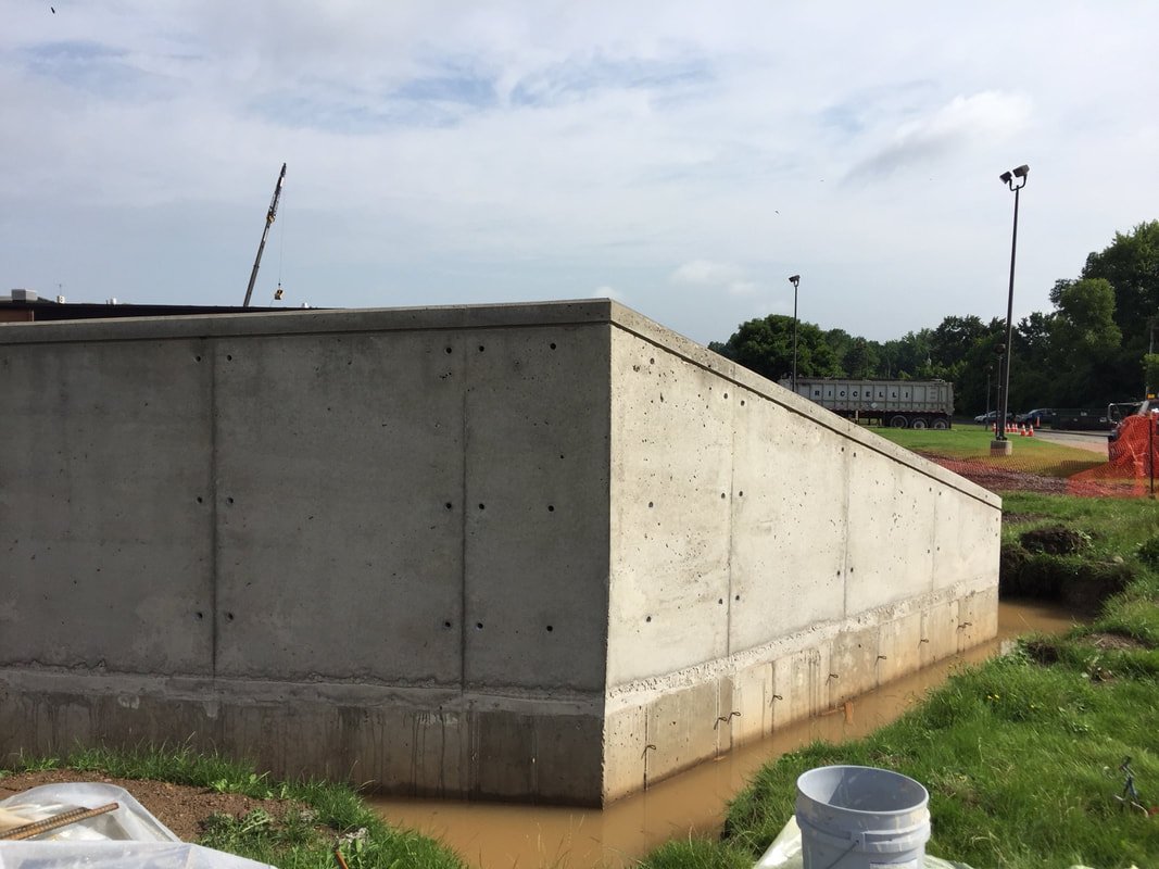 Clean finished cast-in-place retaining wall