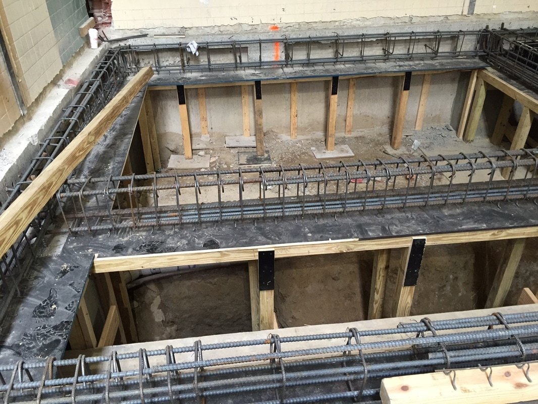 Heavy rebar cage and bracing in a deep foundation pit